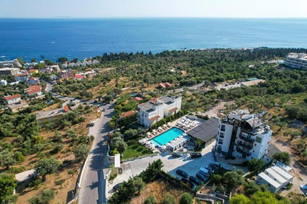 Blue Boutique Hotel in Albania droneview of the hotel with a beautifull sea on the background