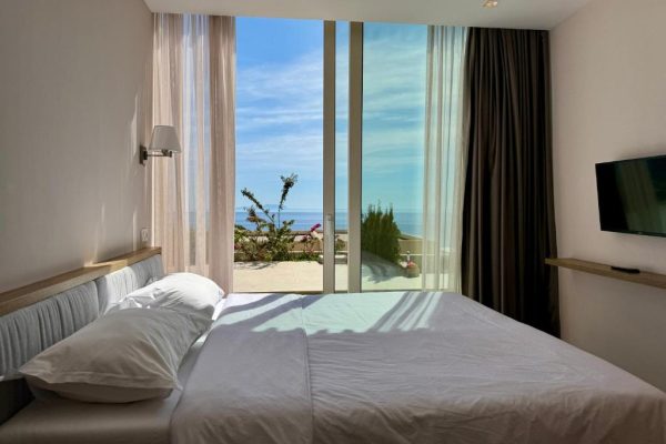 green condo hotel palase masterbedroom from a different angle to show the entire room