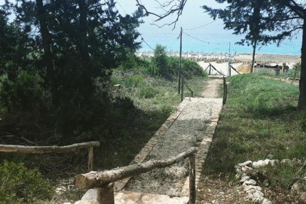 perivolos apartments in albania entrance to the beach where you lay all day if you like it.