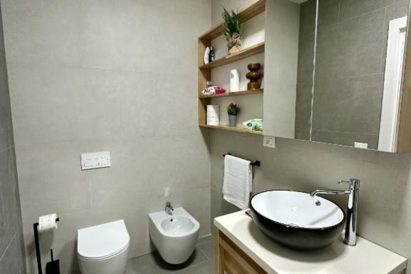 sapphire residence green coast bathroom with a toilet and shower to get refreshed