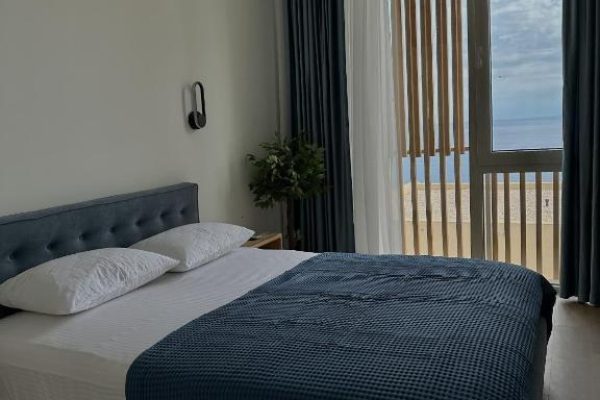 sapphire residence green coast masterbedroom with a seaside view